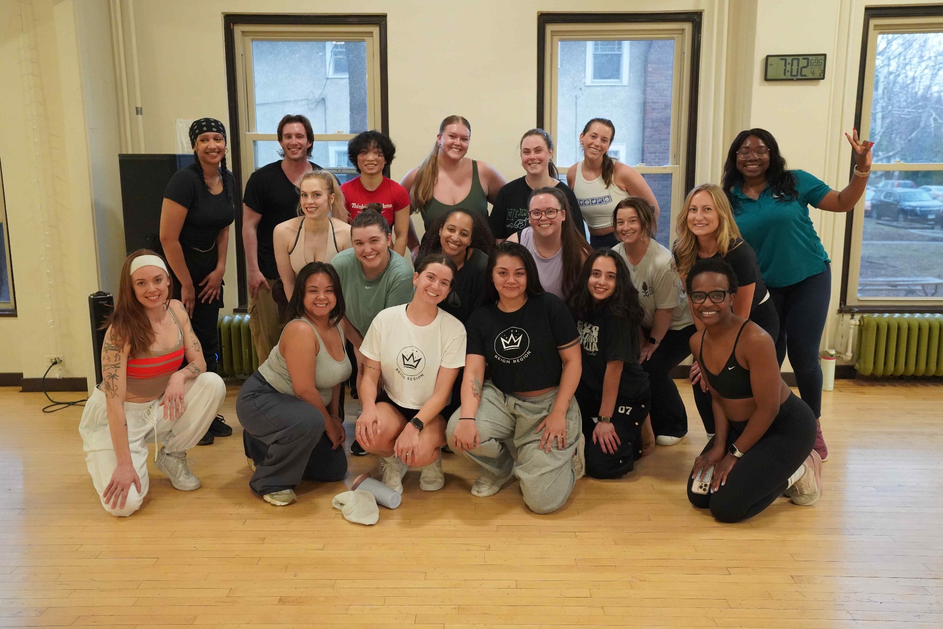 Reign Region Turn Up Dance Fitness group photo inside the South Minneapolis studio